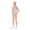 Barbie™ The Movie Ken® Doll Wearing Pastel Striped Beach Matching Set